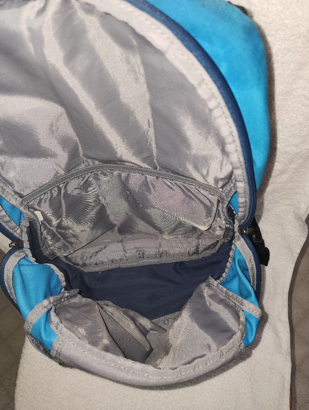 M.169- Under Armour Storm Backpack, blue teal, USED